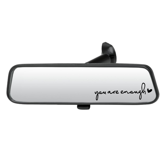 Car interior mirror with 'you are enough' text on a white background